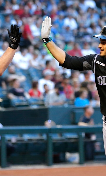 Arenado, Senzatela lead Rockies to rout of D-backs